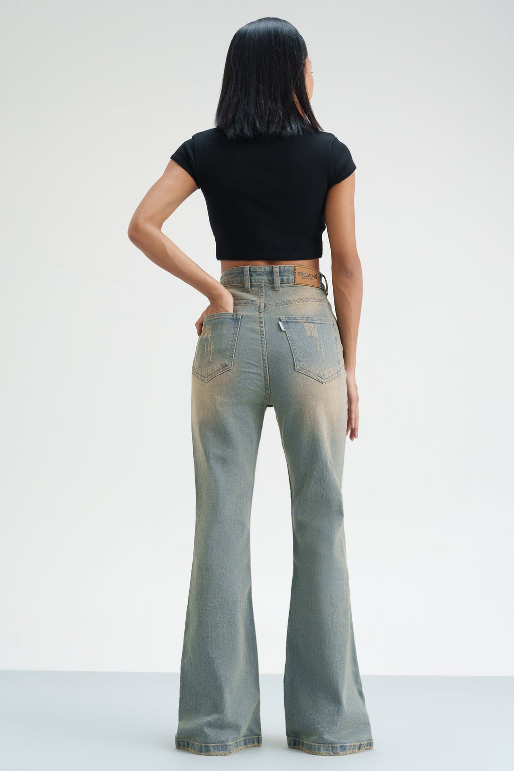 Distressed Sky Bootcut Jeans
